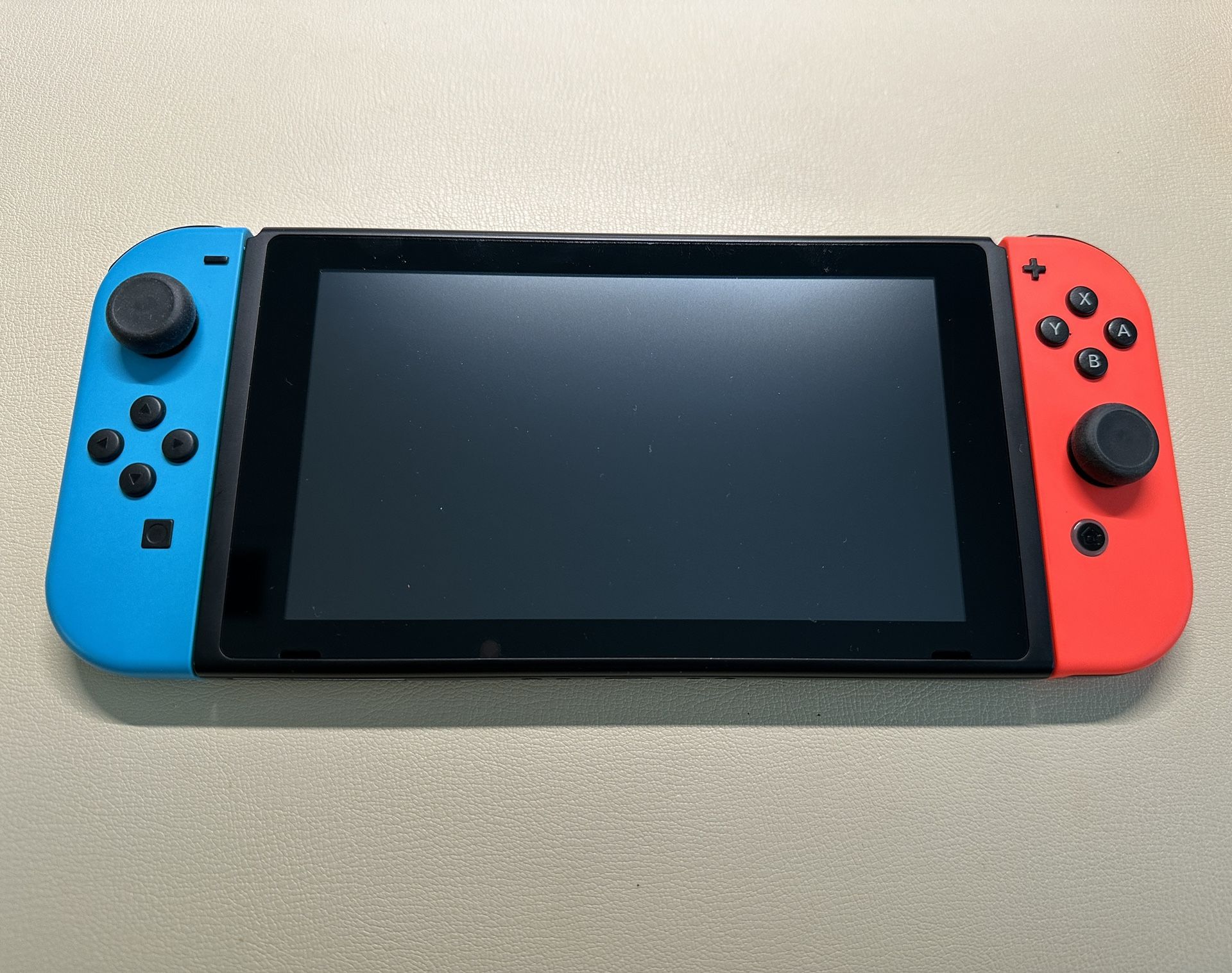 Pre-owned Nintendo Switch & Pro Controller