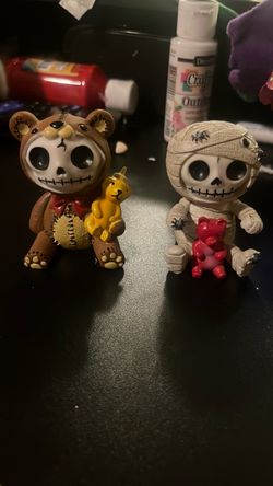 mini skeleton bear and skeleton mummy.