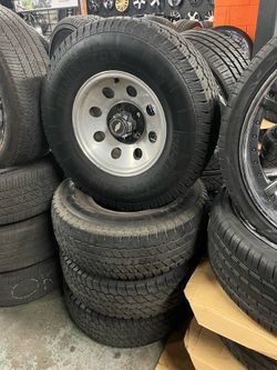 15 inch aluminum five lug Chevy wheels and 31 inch altering tires 15 inch aluminum five lug Chevy wheels and 31 inch altering tires