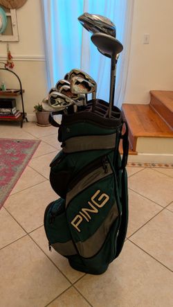 Set of Callaway 2006 Big Bertha irons, woods, driver, wedge, putter & bag
