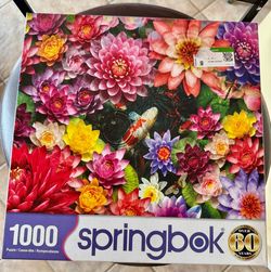 Puzzles by Springbok & White Mountain