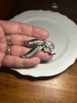 Antique 1940s to 1950s costume jewelry designer brooch by Trifari.