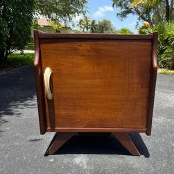 Original mid century wood night table.