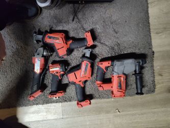 basically brand new Milwaukee tools with one battery and a charger