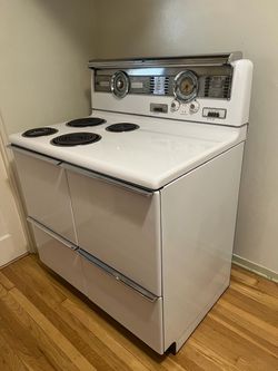 Vintage White Electric Range with Coil Burners