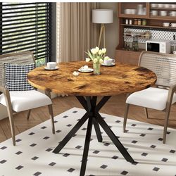 Brown Round Dining Table – Mid-Century Modern 🍽️  💰 $95 📦 Condition: Brand new 📏 Size: 39” round 🪑 Table only (chairs not included)  ✨ Features: 