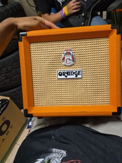 This is an Orange Crush 12 12-watt guitar combo amplifier