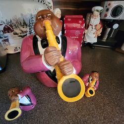 +3
This item is a 1996 "Jazz Player" saxophone man ceramic cookie jar with Salt & Pepper Shakers
