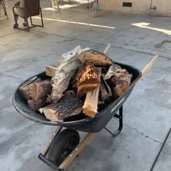 selling firewood 25.00 dollars for a wheel Barrel