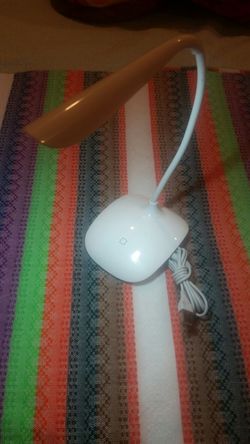 Led desk lamp 3 levels brightness,rechargeable, and flexible.