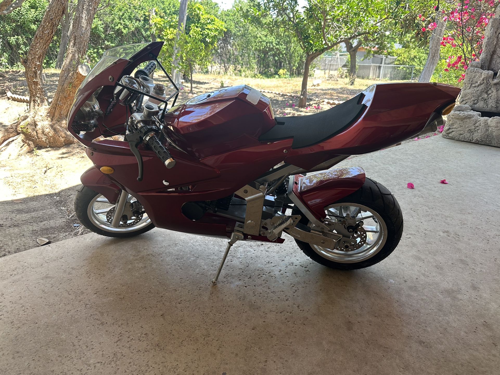 Super Pocket Bike X15 110cc. Red. Gas/oil Powered. 