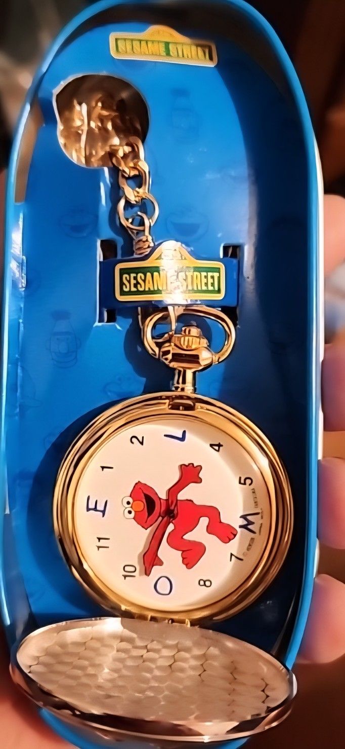 1990's SESAME STREET POCKET WATCH NEW NEEDS BATTERIES