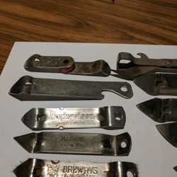 12 vintage can bottle openers