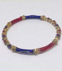 Bangle bracelet in gold tone and red and purple enamel
