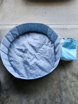 Foldable play-pin or wash bay for dogs/cats.