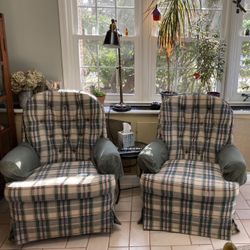 Two Swivel Rocking Chairs