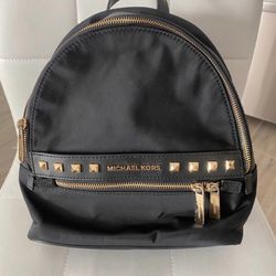 MICHEAL KORS KENLY BLACK AND GOLD MEDIUM  BACKPACK 
