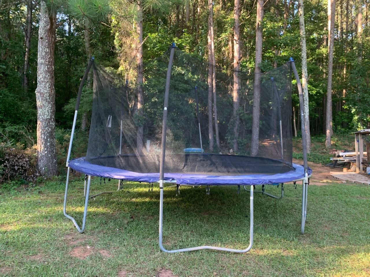 15 foot large trampoline in good condition price $ 200 cash only [already disassembled ready to ride]