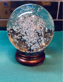 Beautiful large controlled bubble glass Orb/Sphere with a solid wood stand