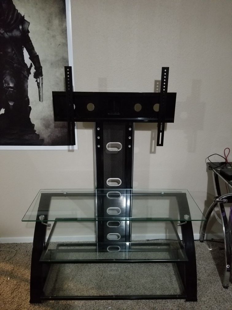 Glass and black steel TV stand.