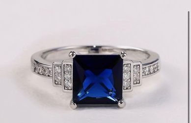 elegant ring princess cut blue stone