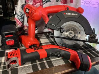Older Black & Decker tool set. Drill saw battery and charger