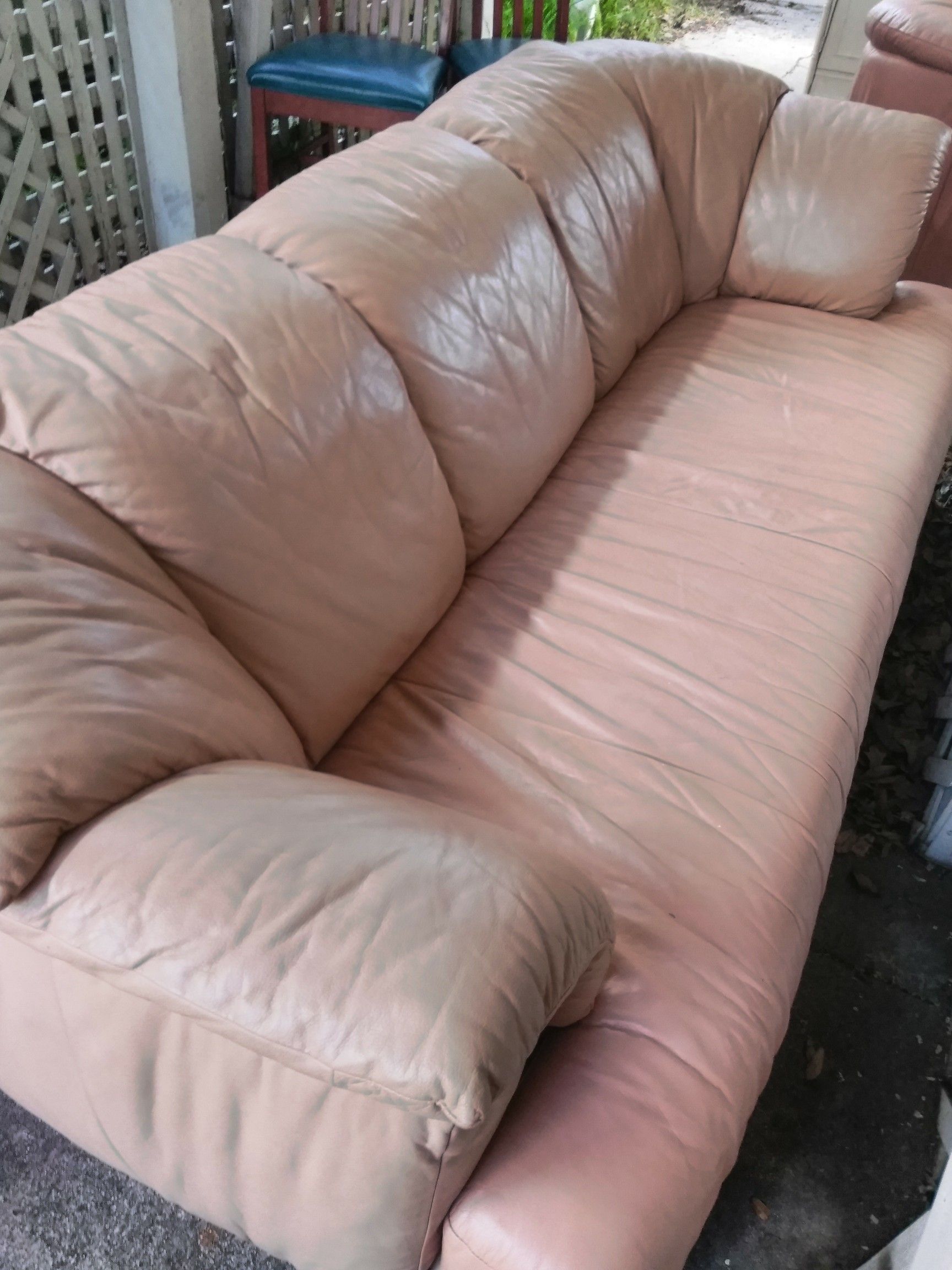HAVE A REALLY NICE SALMON COLOR REAL GENUINE LEATHER COUCH EXCELLENT CONDITION NO RIPS OR STAINS VERY COMFORTABLE CAN DELIVER IF NEEDED
