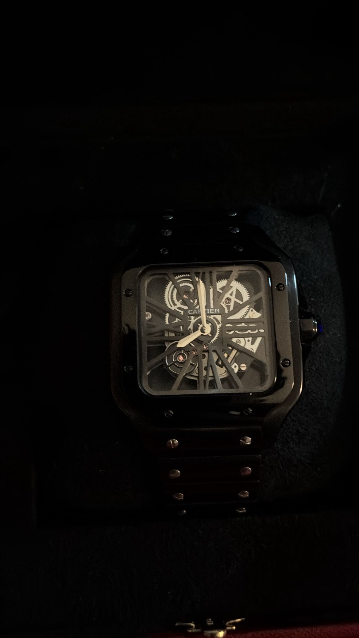 black cartier skeleton watch