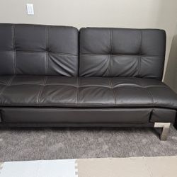 Leather Futon In Excellent Condition 