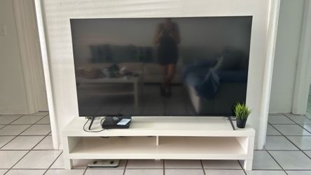 Sony Bravia Google TV Television, IKEA TV stand, and DVD player