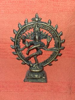 Brass lady with four arms