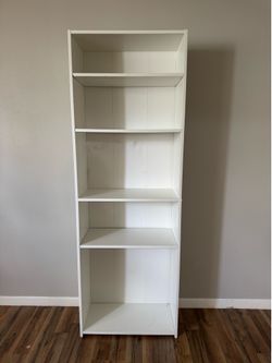 Tall white five shelf bookcase