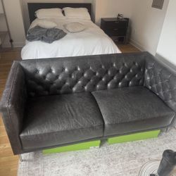 Authentic CB2 black leather sofa