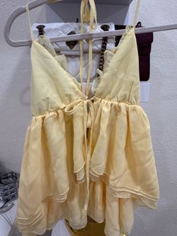 Yellow ruffled shirt
