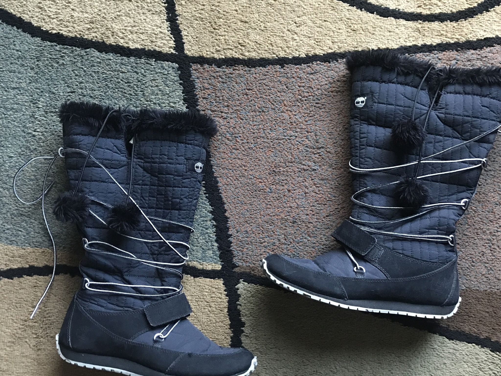 Ladies Timberland Winter Boots - Size 9 These are several years old, but are in good condition with light wear and marks. They have some fur in them