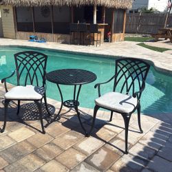 Brand new three-piece patio café dinette set.