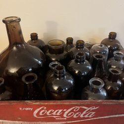 Collection Of amber Glass Bottles And Clear Glass