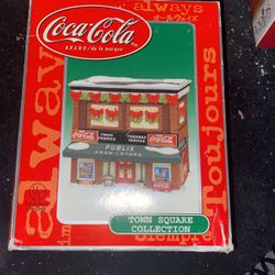 Never opened Coca-Cola collectible Publix town Square collection