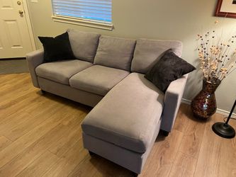 Small gray couch with chaise