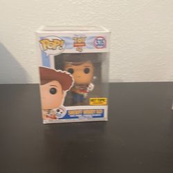 Sheriff Woody Holding Forky Pop