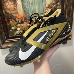 Nike Alpha Menace 4 Pro Black Metallic Gold cleats
