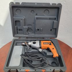 Ridgid Drill with box. Tool for construction and carpentry work. Taladro en su caja
