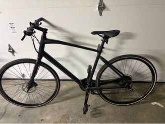 Specialized Sirrus X 2.0 XL flat black and Huffy beach bike