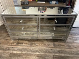 Mirrored dresser.