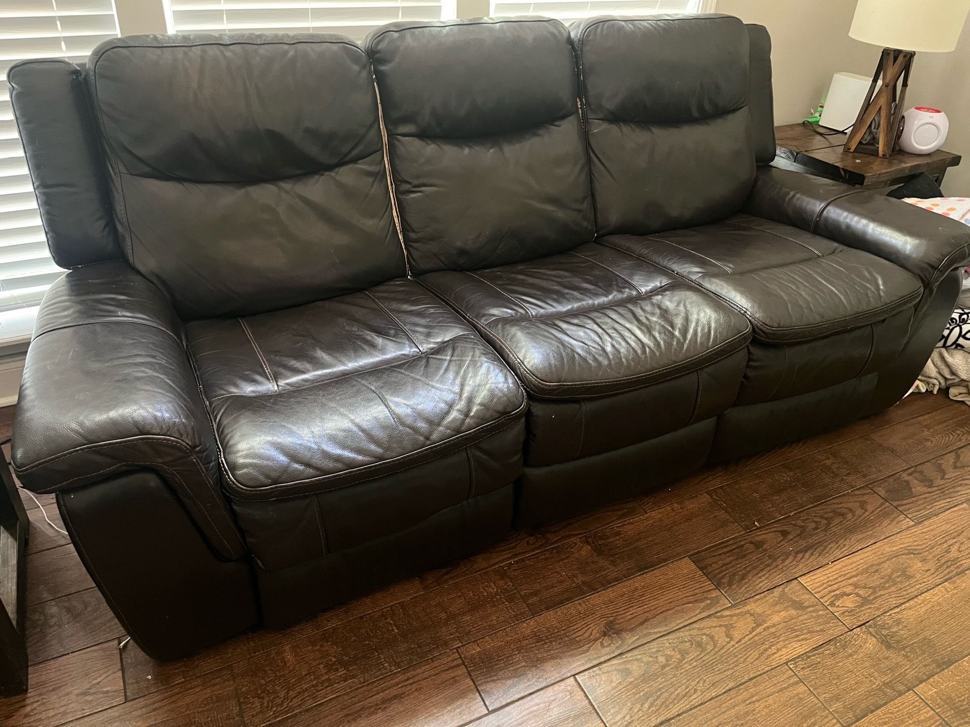 Two electric reclining sofas