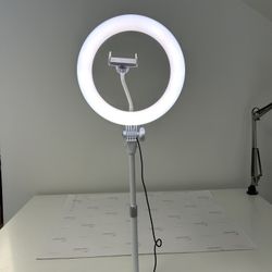 Ring Light With Cell Phone Holder For Taking Pictures.