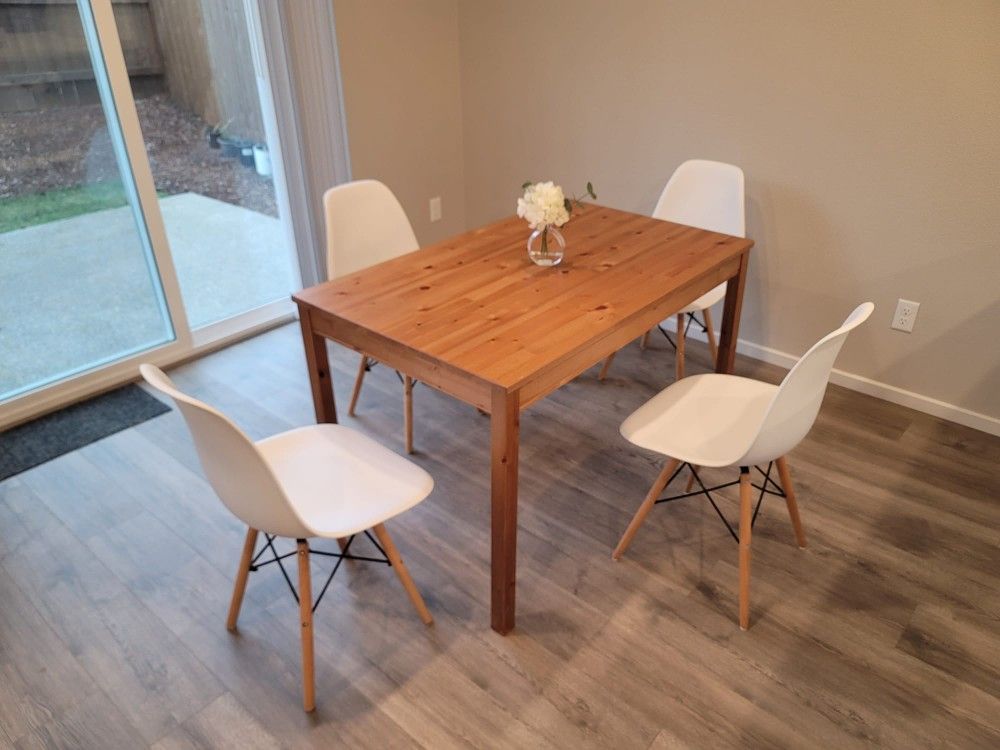 Brown Table and 4 White Chairs