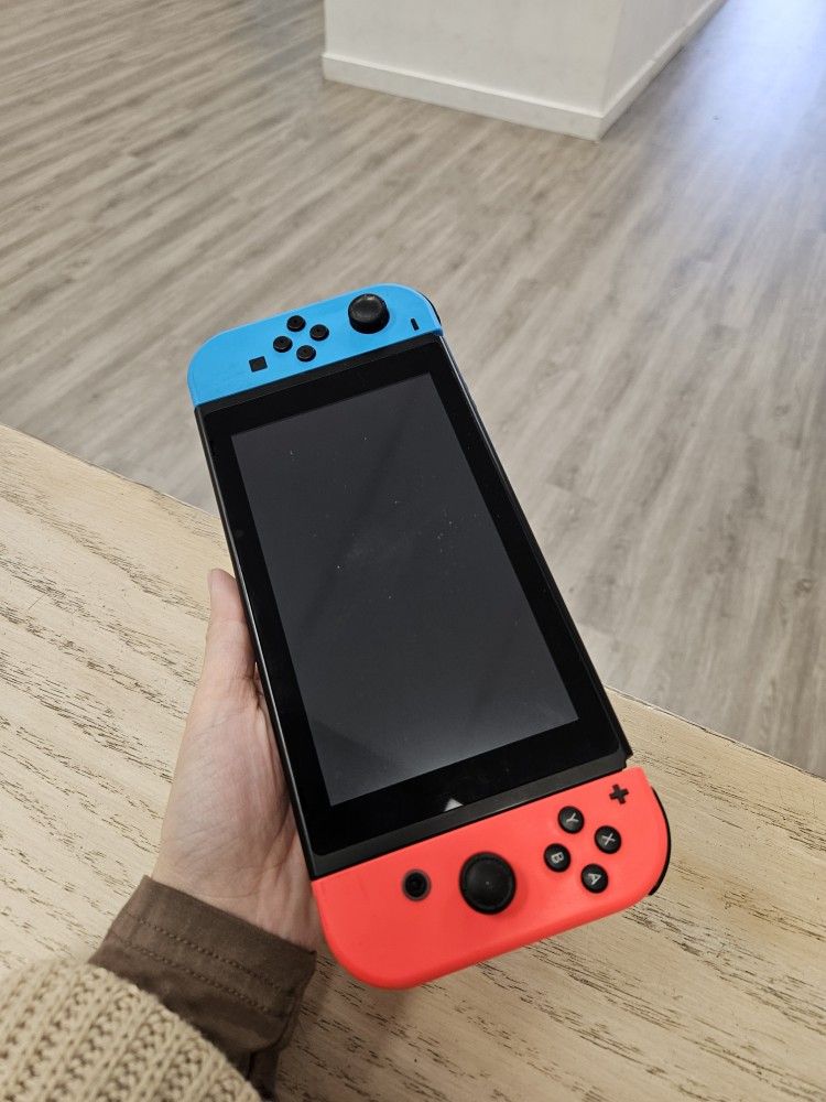 Nintendo Switch V2 Gaming Handheld - Best Deal In Town - $5 Down Today