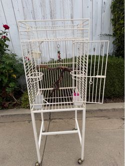 Bird cage in good condition  16” wide 16” side  47” high
