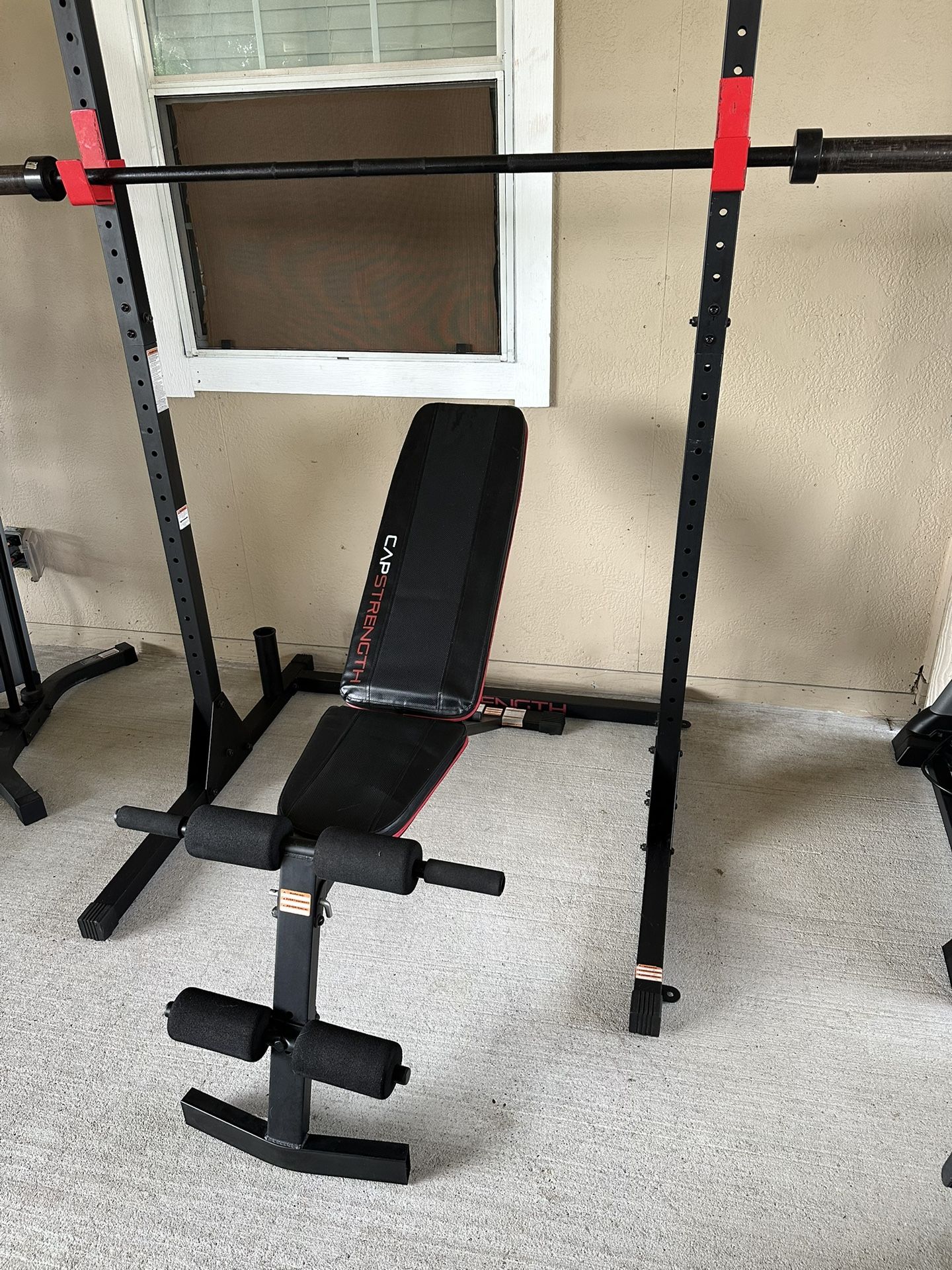 CAP Barbell Multi-Functional Power and Squat Rack with Bar Holder, adjustable bench & 45Lb barbell $250